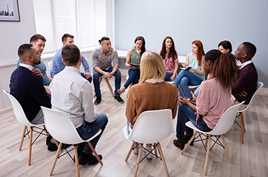 A support group sharing stories.