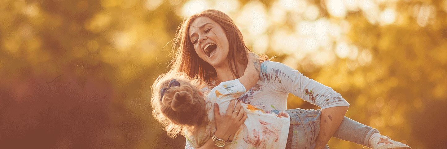 mother and daughter laughing