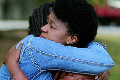 two women hugging