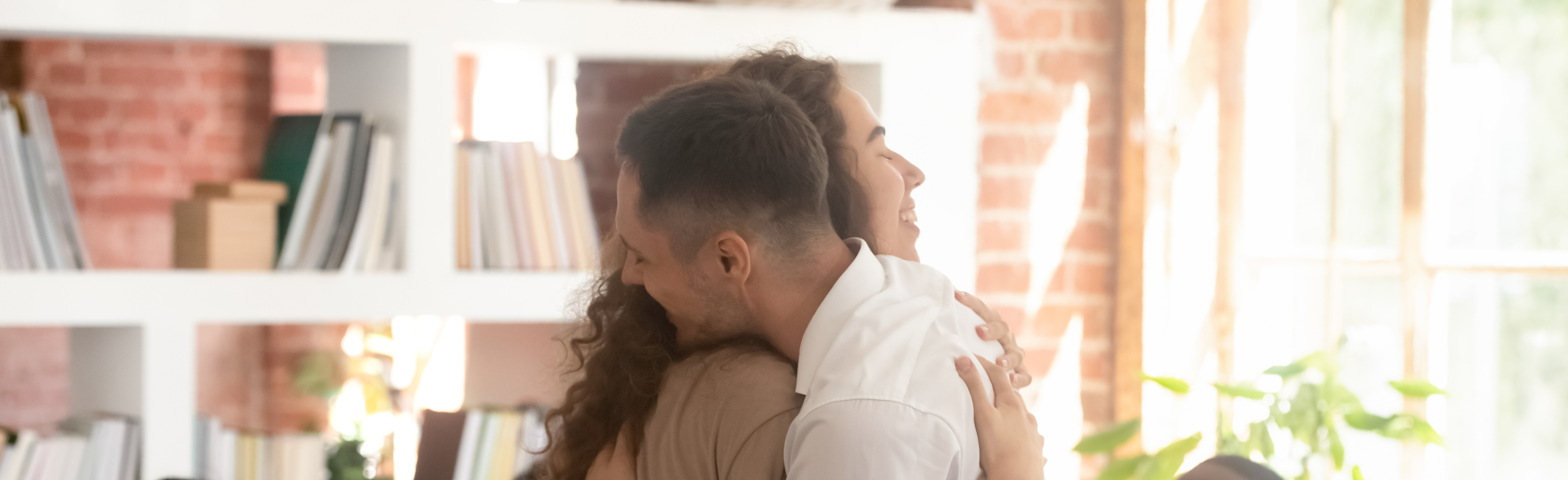 Two people hugging