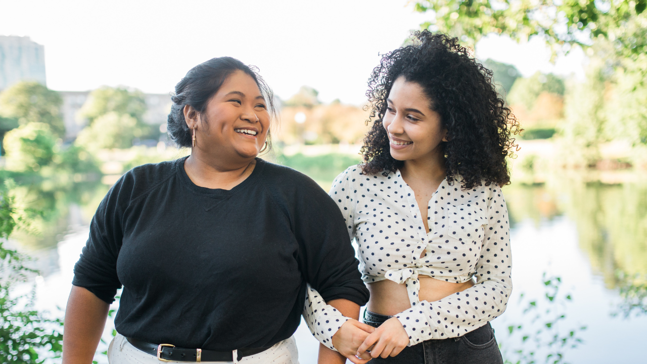 Women with linked arms