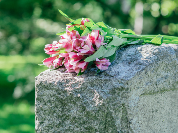 Grave stone with flowers